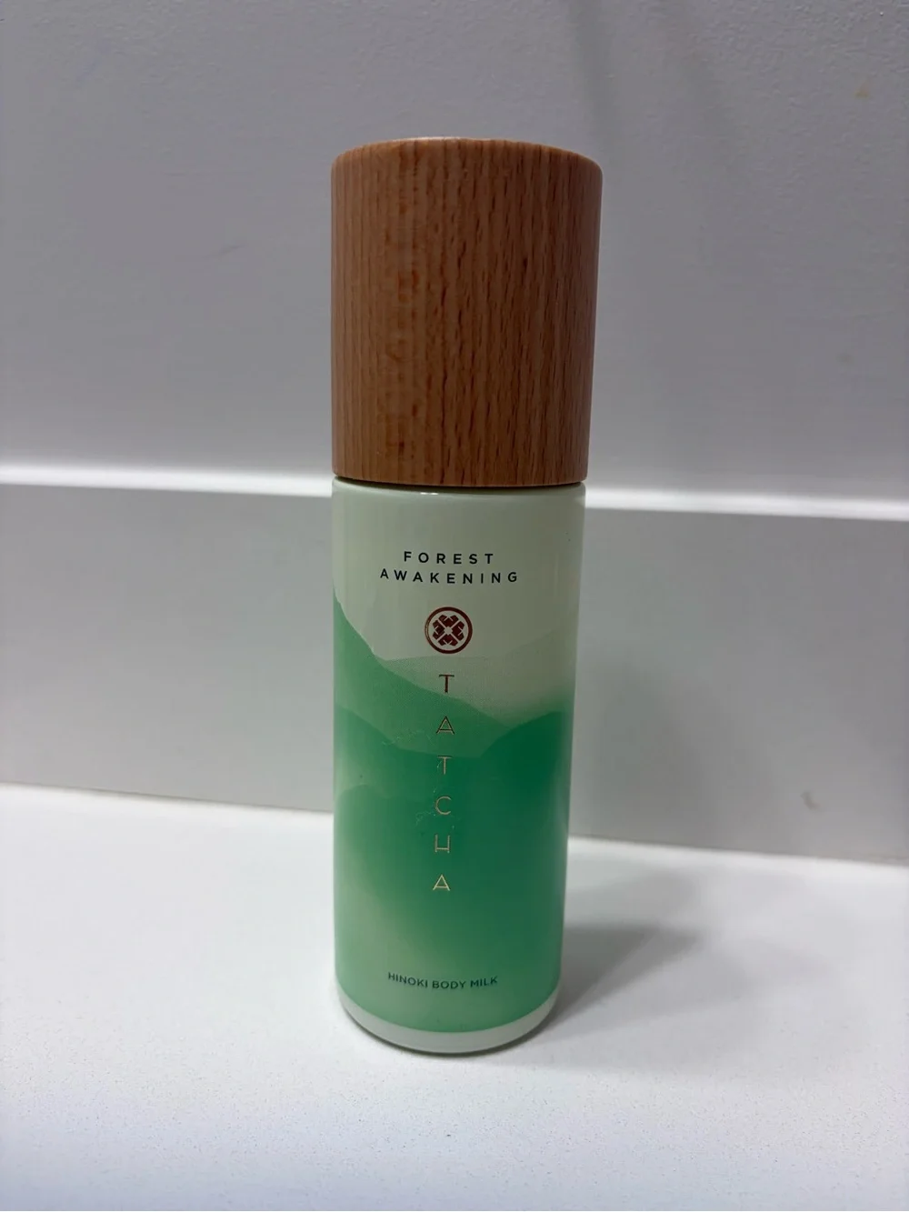 Discontinued Tatcha Forest Awakening Hinoki Body Milk - light green and wood ton